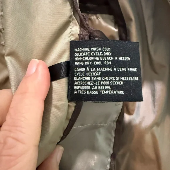 Cole Haan Chic Rain Coat with back bow & hideaway hood. Iridescent beige in XS. - Picture 10 of 13